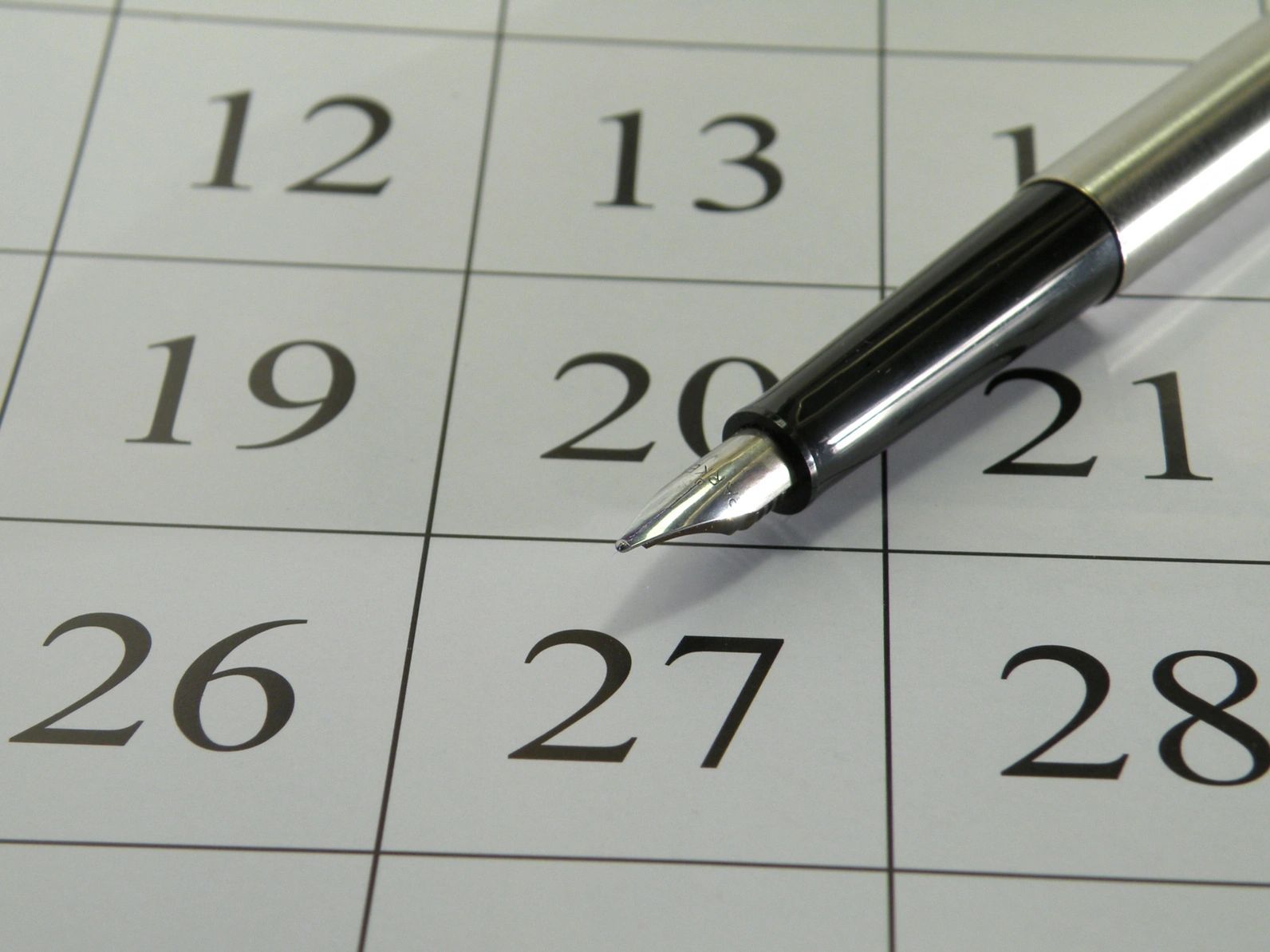 Fountain pen on calendar