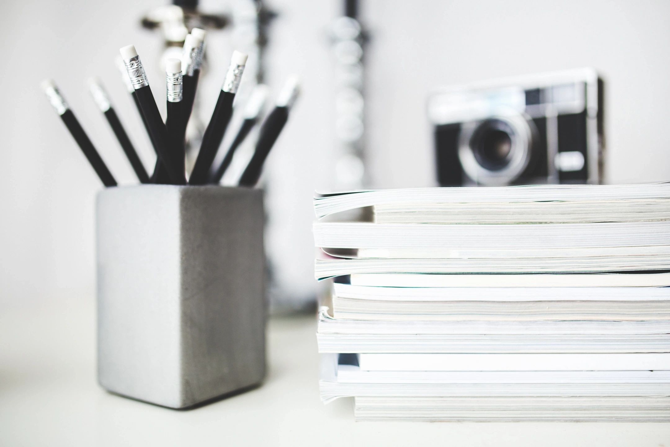 Minimalist workspace with pencils and books